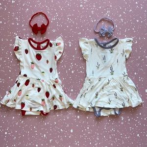 (2) Kyte baby Twirl Bodysuit Dresses with free matching bows from Baby Bling